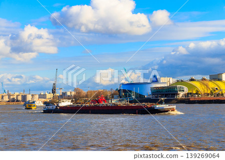 Industrial barge carrying scrap metal for recycling on the river Elbe in Hamburg, Germany Industrial barge carrying scrap metal for recycling on the river Elbe in Hamburg, Germany 139269064