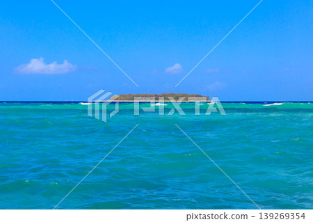 View of Mnemba island in the Indian Ocean, Zanzibar, Tanzania View of Mnemba island in the Indian Ocean, Zanzibar, Tanzania 139269354
