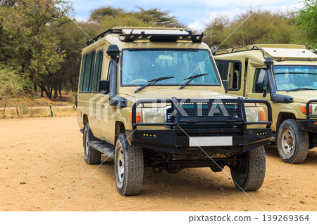 SUV cars parking in Tarangire national park, Tanzania SUV cars parking in Tarangire national park, Tanzania 139269364
