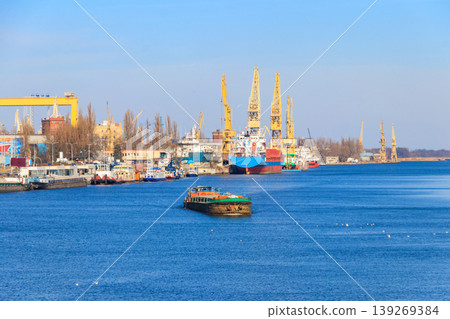 Barge sailing on the Oder river in Szczecin, Poland Barge sailing on the Oder river in Szczecin, Poland 139269384