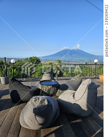 this is soft sofa with a mountain background 139269412