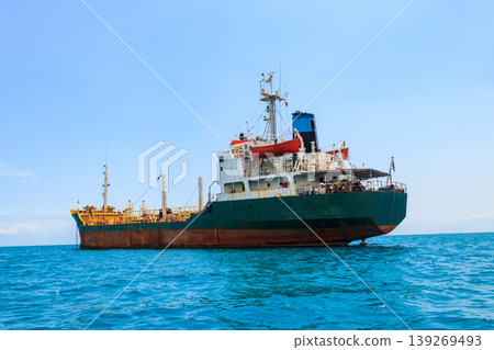 Large industrial ship sailing in the Indian ocean near Zanzibar, Tanzania Large industrial ship sailing in the Indian ocean near Zanzibar, Tanzania 139269493