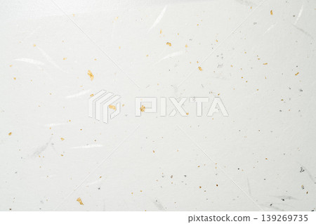 A material with gold and silver scattered on a white background of Japanese paper. A material with gold and silver scattered on a white background of Japanese paper. 139269735