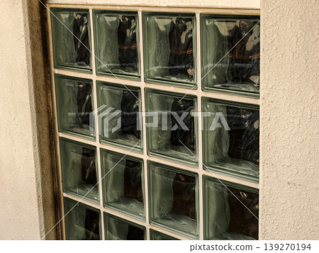 A landscape with lattice-patterned glass windows 139270194