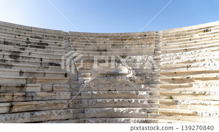 Stone seating tiers and stage wall of the Lycian League Assembly theater at Patara archaeological site, Antalya, Turkey, world's first democratic parliamentary building. 139270840