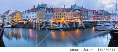 Nyhavn canal waterfront with moored boats at dawn in Copenhagen Denmark Nyhavn canal waterfront with moored boats at dawn in Copenhagen Denmark 139270853