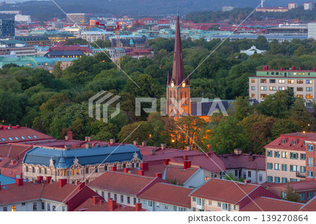 Church spire above Gothenburg rooftops at dusk in Sweden Church spire above Gothenburg rooftops at dusk in Sweden 139270864