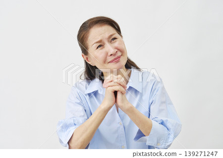 Elderly woman begging on white background 139271247