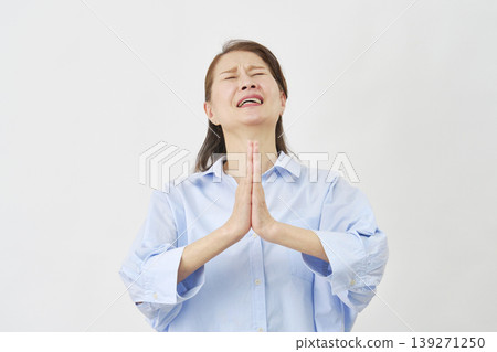 Elderly woman begging on white background 139271250