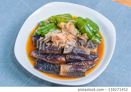 Grilled eggplant and bell peppers marinated in Japanese-style broth. Grilled eggplant and bell peppers marinated in Japanese-style broth. 139271452