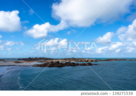 Granite islands and blue waters near Tregastel, Brittany, France Granite islands and blue waters near Tregastel, Brittany, France 139271539