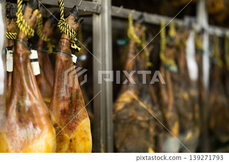 Legs of Spanish jamon ready for sale in grocery Legs of Spanish jamon ready for sale in grocery 139271793