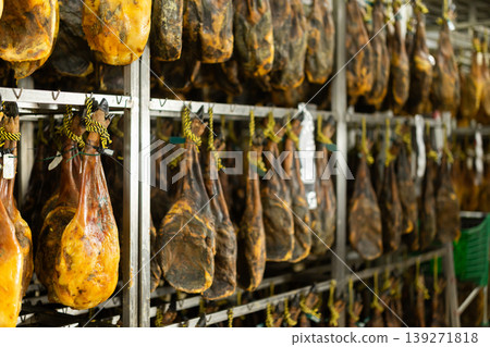 Legs of Spanish jamon ready for sale in grocery Legs of Spanish jamon ready for sale in grocery 139271818