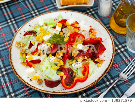 Vegetable salad with corn and bell peppers on a plate Vegetable salad with corn and bell peppers on a plate 139271879
