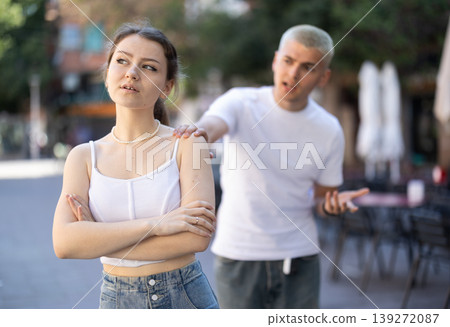 guy and his girlfriend quarreled on the street guy and his girlfriend quarreled on the street 139272087
