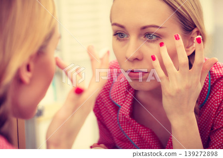 Woman applying moisturizing skin cream. Skincare. Woman applying moisturizing skin cream. Skincare. 139272898