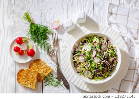 Fresh cabbage and radish coleslaw in white bowl Fresh cabbage and radish coleslaw in white bowl 139273143