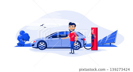 Smiling Man Standing next to Charging Electric Car Smiling Man Standing next to Charging Electric Car 139273424