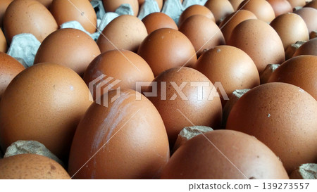 Close-up image of fresh chicken eggs in a cardboard tray. Close-up image of fresh chicken eggs in a cardboard tray. 139273557
