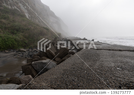 The cliffs and wave-cut platforms of Byobugaura, shrouded in spring morning mist. The cliffs and wave-cut platforms of Byobugaura, shrouded in spring morning mist. 139273777