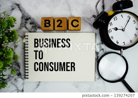 B2C Business to Consumer text with alarm clock and magnifying glass on marble background 139274207