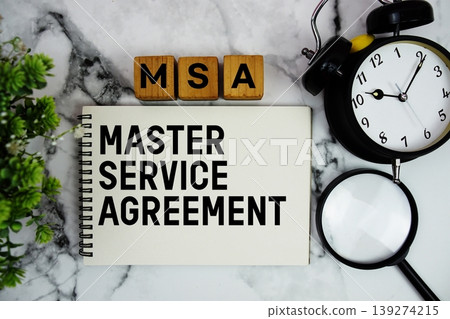 MSA Master Service Agreement text with alarm clock and magnifying glass on marble background MSA Master Service Agreement text with alarm clock and magnifying glass on marble background 139274215