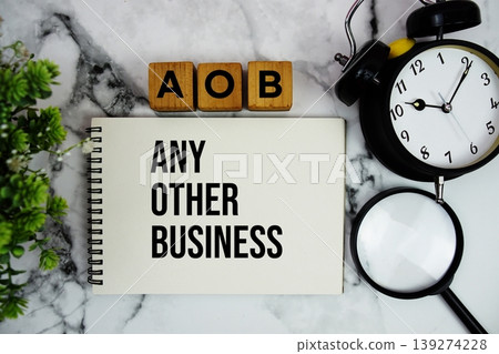 AOB Any Other Business text with alarm clock and magnifying glass on marble background AOB Any Other Business text with alarm clock and magnifying glass on marble background 139274228