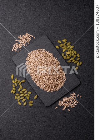 Shelled sunflower seed kernels, salted, roasted, or raw, are a healthy ingredient. Sunflower seeds Shelled sunflower seed kernels, salted, roasted, or raw, are a healthy ingredient. Sunflower seeds 139274637
