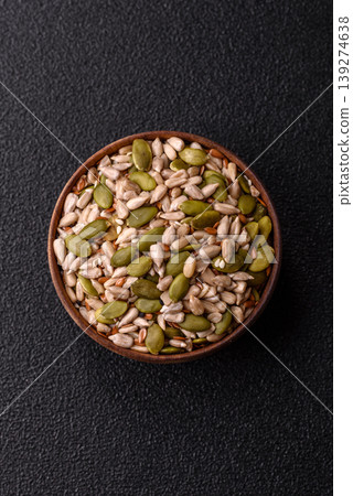 Shelled sunflower, sesame, pumpkin, and flaxseed kernels as ingredients for healthy food Shelled sunflower, sesame, pumpkin, and flaxseed kernels as ingredients for healthy food 139274638