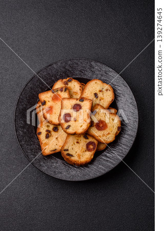 Fruit cake, a dessert with cherries, plums, and raisins for a festive Christmas table. Fruit cake 139274645