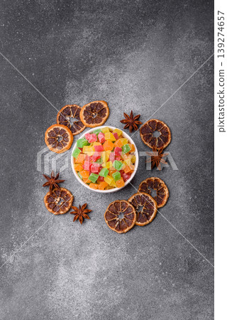 Candied fruit in colorful cubes as an ingredient for baked goods and sweets. Candied fruit Candied fruit in colorful cubes as an ingredient for baked goods and sweets. Candied fruit 139274657