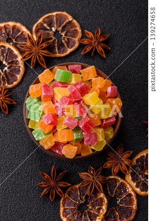 Candied fruit in colorful cubes as an ingredient for baked goods and sweets. Candied fruit Candied fruit in colorful cubes as an ingredient for baked goods and sweets. Candied fruit 139274658