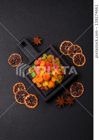 Dried apricots, raisins, and candied fruits as ingredients for baked goods and sweets. Dried fruits 139274661