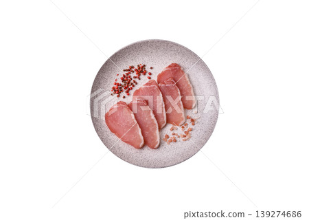 Smoked or dry cured meat slices, pork or ham with salt and spices. Smoked meat slices Smoked or dry cured meat slices, pork or ham with salt and spices. Smoked meat slices 139274686