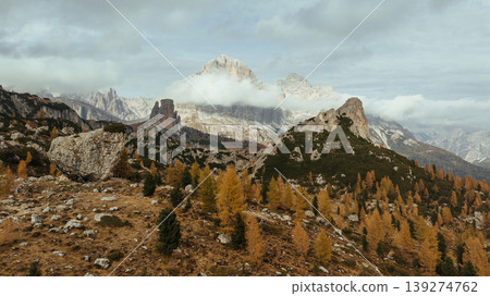 Pass near Cortina mountain. Aerial majestic view of popular place at autumn season, background Pass near Cortina mountain. Aerial majestic view of popular place at autumn season, background 139274762