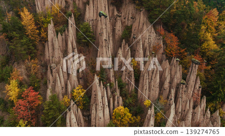 Earth pyramids of Platten at daytime, aerial view, at autumn season time 139274765