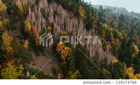 Earth pyramids of Platten at daytime, aerial view, at autumn season time Earth pyramids of Platten at daytime, aerial view, at autumn season time 139274766