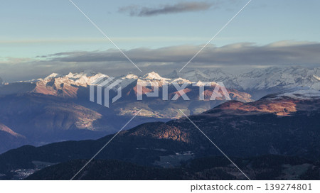 Far away, clouds in the sky, sunlight on the rocks. Seceda mountain, aerial view of majestic nature, beautiful touristic place Far away, clouds in the sky, sunlight on the rocks. Seceda mountain, aerial view of majestic nature, beautiful touristic place 139274801