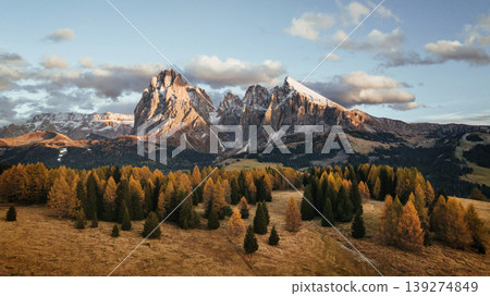 Mountains are at background. Alpe di Siusi, Seiser Alm, aerial view of majestic dolomites Mountains are at background. Alpe di Siusi, Seiser Alm, aerial view of majestic dolomites 139274849