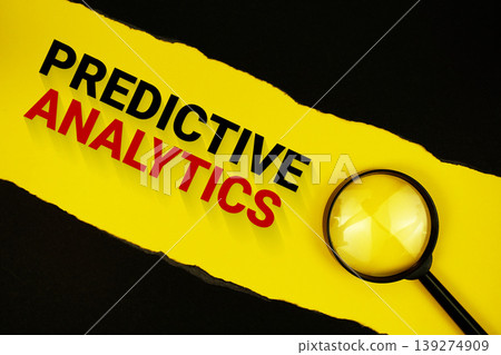 Predictive Analytics text on yellow with black paper torn ripped and magnifying glass 139274909