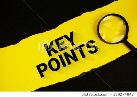 Key Points text on yellow with black paper torn ripped and magnifying glass Key Points text on yellow with black paper torn ripped and magnifying glass 139274942
