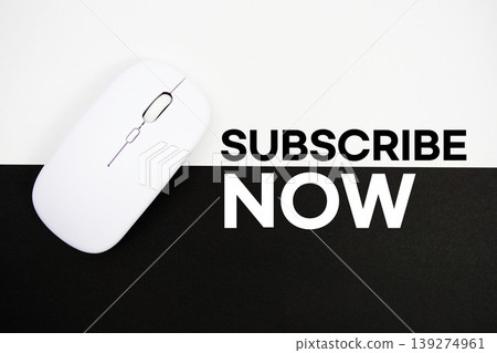 Subscribe Now text and wireless mouse on white and black background 139274961