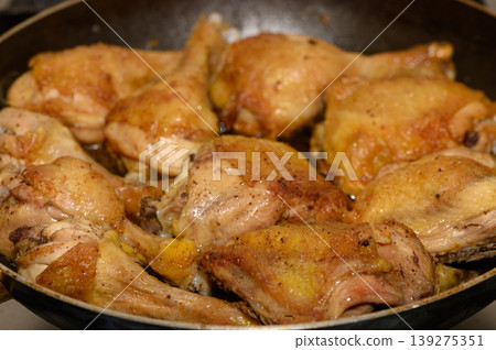 Golden Fried Chicken Drumsticks and Thighs in Skillet Golden Fried Chicken Drumsticks and Thighs in Skillet 139275351