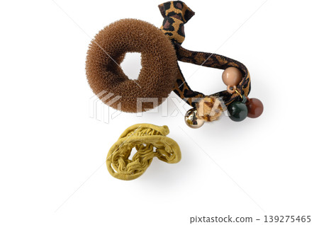 Leopard Print Hair Scrunchie and Bun Maker Donut Isolated on White Background Leopard Print Hair Scrunchie and Bun Maker Donut Isolated on White Background 139275465