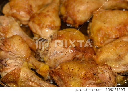 Golden Brown Pan Fried Chicken Legs and Thighs in Skillet Golden Brown Pan Fried Chicken Legs and Thighs in Skillet 139275595