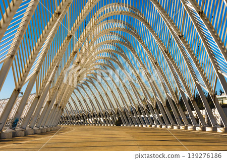 Modern white steel arch structure in Athens Olympic Complex, Greece. Modern white steel arch structure in Athens Olympic Complex, Greece. 139276186