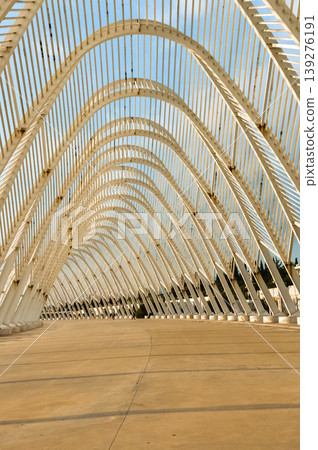 Symmetrical view of Calatrava roof arches at Olympic Complex Athens. Symmetrical view of Calatrava roof arches at Olympic Complex Athens. 139276191