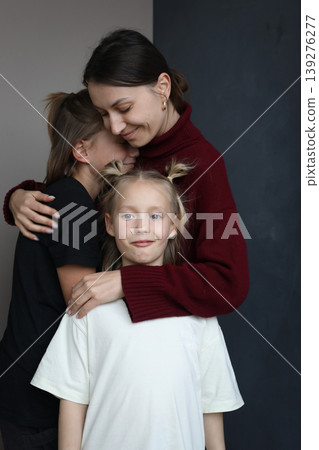 Lovely family indoor portrait. Mother, son and daughter. Lovely family indoor portrait. Mother, son and daughter. 139276277
