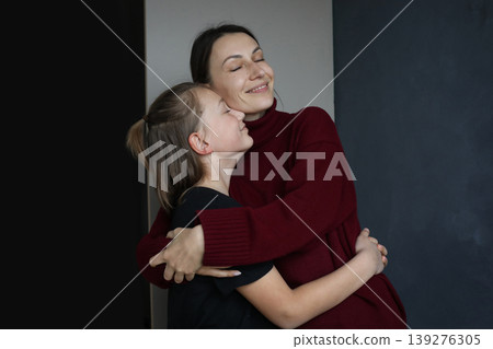 Loving mother and son indoor portrait Loving mother and son indoor portrait 139276305