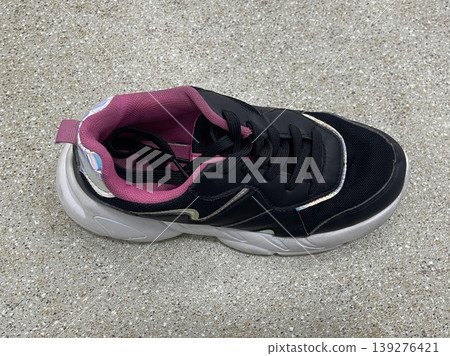 sneaker on the gray background. top view sneaker on the gray background. top view 139276421